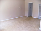 Property Image 908Living room and hall way with linen closet
